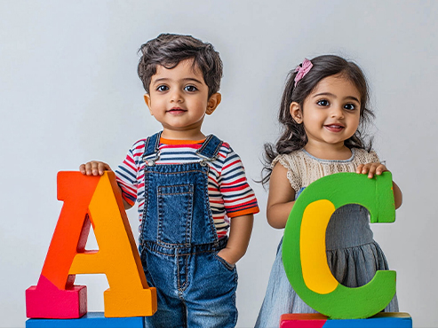 Children writing and learning in classroom